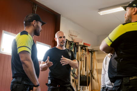 Tommy tillsammans med kollegor.